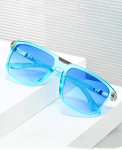 Detail of light blue square sunglasses with black metal nose bridge on geometric blocks