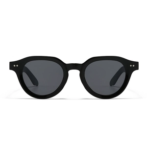 Modern round black sunglasses with decorative double silver rivets and dark grey lenses