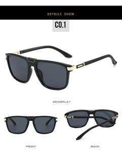 Macro detail of black square sunglasses with gold hinges and carbon fiber textured temples