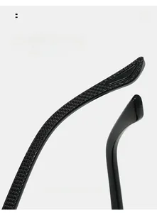 Detail view of ergonomic curved sunglasses temples with glossy black anti-slip texture