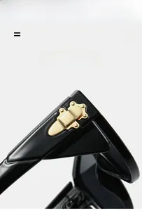 Detail of square vintage sunglasses showing the gold retro hinge with lightweight frame