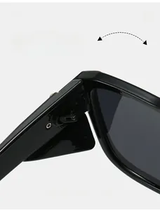Detail of durable metal hinges and polished black frame on square retro sunglasses