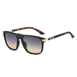 Ultralight metal sunglasses with gradient lenses and tortoiseshell temples seen at 45 degrees