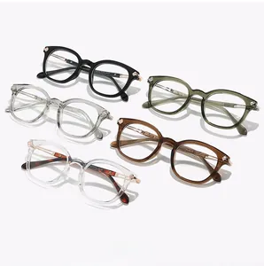 Detail of five retro TR90 eyewear frames in black, olive, amber and clear colors