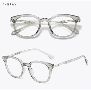 Detail view of transparent grey round TR90 glasses frames with metal hinge accents