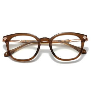 Retro round tortoise shell TR90 eyeglasses frame with clear lenses on white background