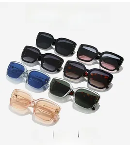 Flat lay of square cat-eye sunglasses in six various colors with polished frames