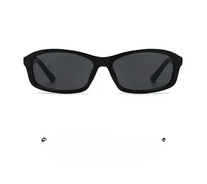 Detailed close-up of square black sunglasses frame with dark grey lenses on white background