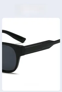 Close-up of smooth hinges and polished black frame joints on vintage polygon sunglasses