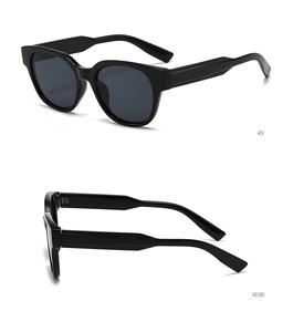 Detail showing 45-degree and side views of vintage polygonal black sunglasses