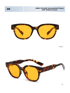 Detailed front and side view of vintage tortoiseshell sunglasses with yellow tinted lenses