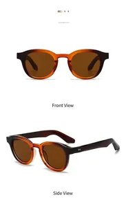 Detail of vintage amber oval sunglasses featuring classic metal rivets and brown lenses