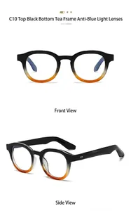 Detail view of round vintage sunglasses with black-to-tea gradient frames and rivets