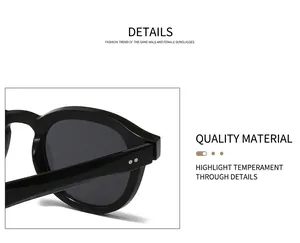 Close-up of black frame sunglasses showing double rivet hinges and polished texture