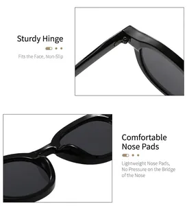 Detailed view of durable metal hinges and comfortable nose pads on black retro sunglasses
