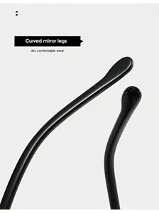 Detailed close-up of curved glossy black sunglass temples designed for comfort wear