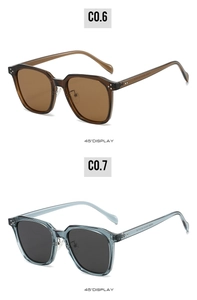 Detail view of TR90 polarized sunglasses in brown and blue-grey frames with rivets