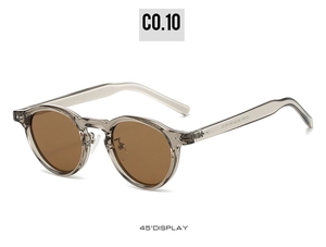 Detail view of transparent grey TR90 round sunglasses with polarized tea lenses at 45-degree