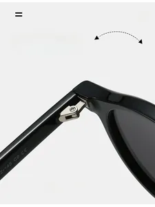 Detail of durable metal hinge and frame engraving on black TR90 polarized sunglasses