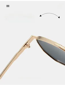 Macro view of durable golden metal hinge on square aviator sunglasses frame
