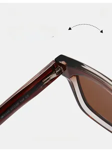 Close-up of durable metal hinge on brown acetate square sunglasses with size specs