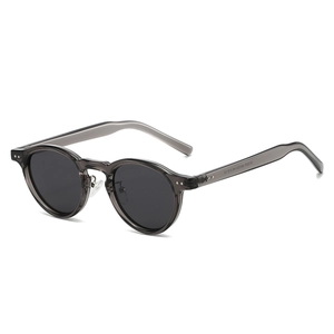 Retro TR90 polarized round sunglasses in transparent grey frame with dark grey lenses