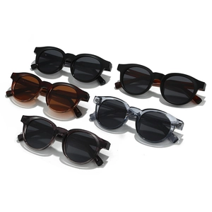 Retro round polarized sunglasses collection in black, amber, and translucent grey frames