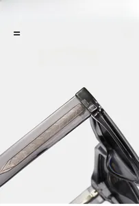 Detail of translucent gray frame showing the premium metal core wire texture and flexibility