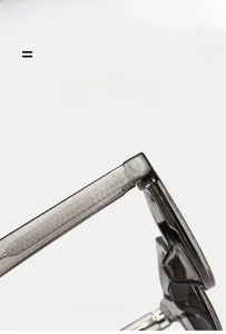 Macro detail of translucent gray frame showing the reinforced internal metal core structure