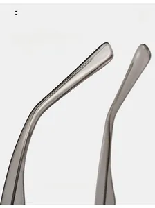 Macro shot of curved translucent grey glasses temples with reinforced metal inner core