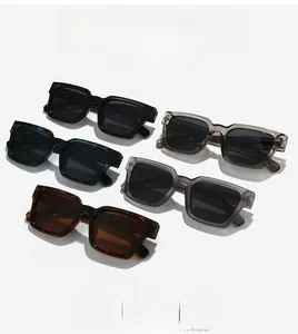 Flat lay of polarized square sunglasses in black, blue, tortoise, and frosted grey colors