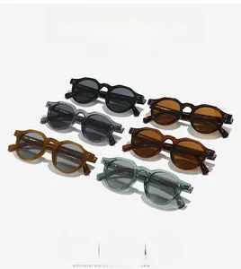 Matrix display of vintage round sunglasses in six various colors with rivet detailing