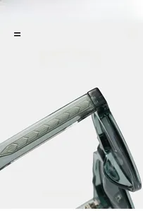 Macro detail of dark green vintage sunglasses showing hinge and leaf texture temple