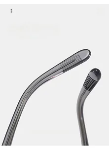 Macro detail of ergonomic curved temple tips on retro round frame sunglasses with anti-slip texture