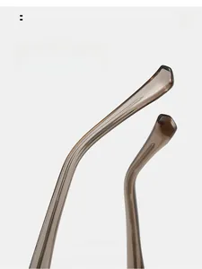 Detailed macro view of curved amber brown resin temple tips for cat-eye sunglasses