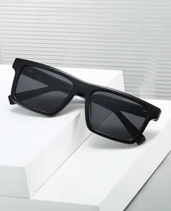 Macro shot of product code YX82357 printed on black square frame spring hinge glasses