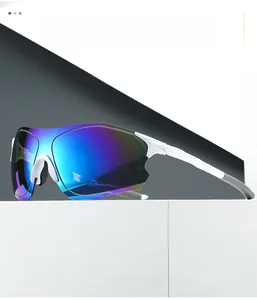 Close-up of white cycling sunglasses with purple-blue gradient mirror lens and nose pads