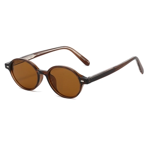 Retro round tortoise frame sunglasses with metal rivets and brown tinted lenses