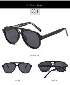 Detail view of black aviator sunglasses with retro double bridge and polarized lenses