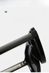 Macro shot of durable hinges and silver diamond texture on black aviator sunglasses