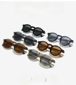 Detailed flat lay of vintage round sunglasses in multiple colors with visible metal cores