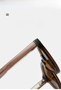 Detail of light brown translucent frame with anti-slip leaf texture and elastic temples