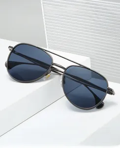 Detail of pilot metal frame with double bridge and blue gradient protective lenses