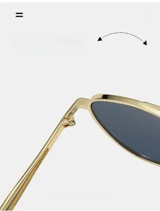 Close-up of durable metal hinge on double-bridge pilot sunglasses with polished finish