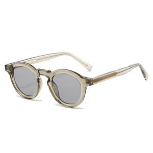 Vintage round frame sunglasses in olive green acetate with metal core temple detail