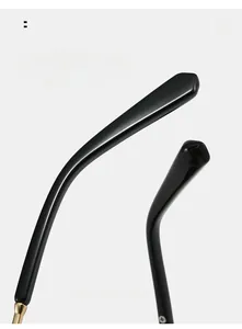 Détail macro des branches incurvées ergonomiques sur lunettes de soleil carrées noires