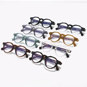 Detail showing various colors of round acetate eyeglass frames with anti-blue light lenses
