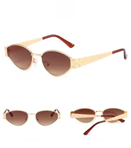 Detailed views of gold oval metal sunglasses with engraved temples and brown lenses