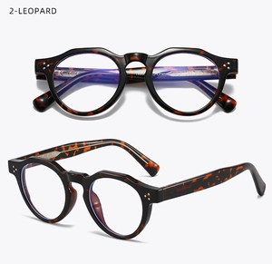 Detail view of round leopard print TR90 glasses frames with silver decorative dots