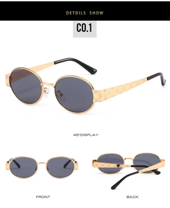 Detailed views of vintage oval sunglasses with engraved gold metal frames and dark lenses